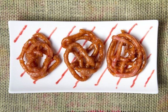 Celebrating the New Year with Rhubarb Jalebi in Cardamom Syrup