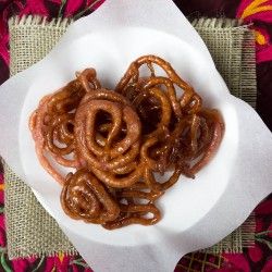 Celebrating the New Year with Rhubarb Jalebi in Cardamom Syrup