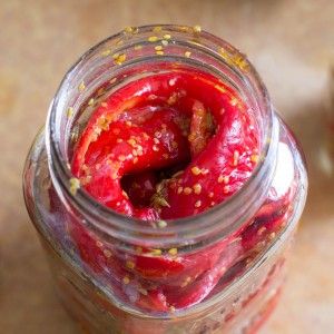 Red Chili Pickle - a vibrant spicy pickle of fresh red chilies and split mustard seeds