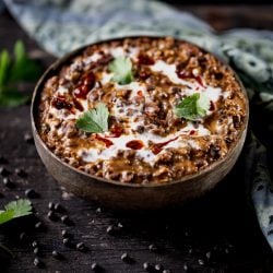 Bowl of dal makhani with cream on top
