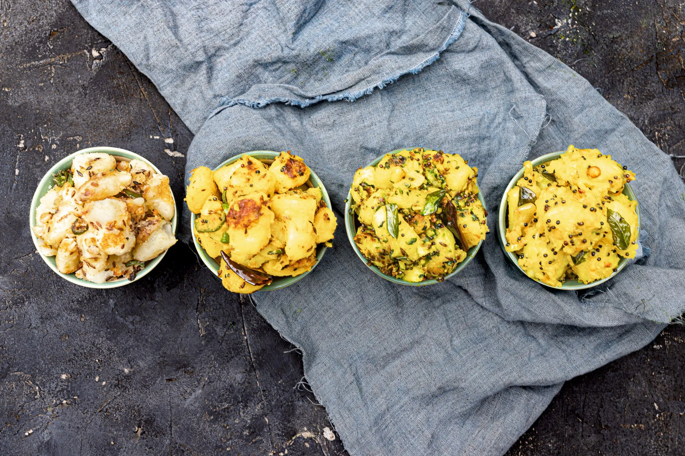 4 potato dishes made with 4 different vaghars