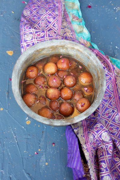 Gulab jamun soaking in sugar syrup