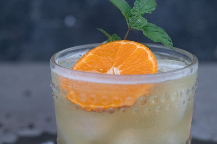 Garnish with mint and tangerine