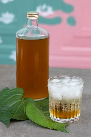 Paan cordial with a paan liqueur soda drink in foreground