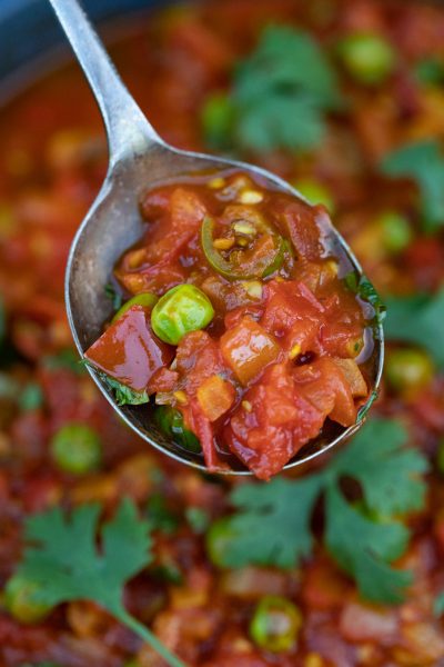 Tomato chutney on a spoon