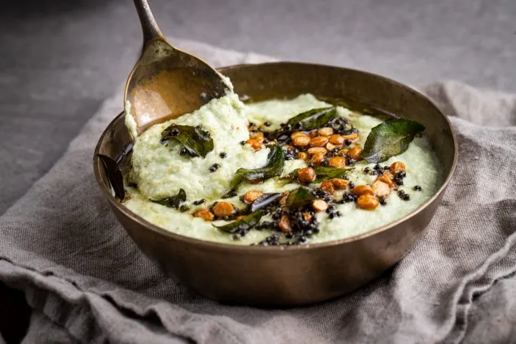 Bowl of coconut chutney with a spoon
