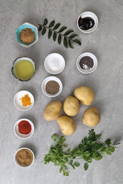 Ingredients of batata nu shaak