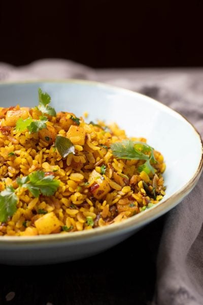 Bowl of red rice poha